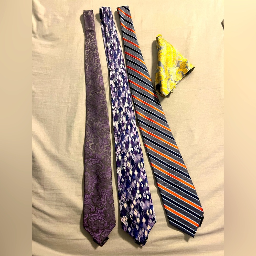 3 assorted ties and 1 pocket square.